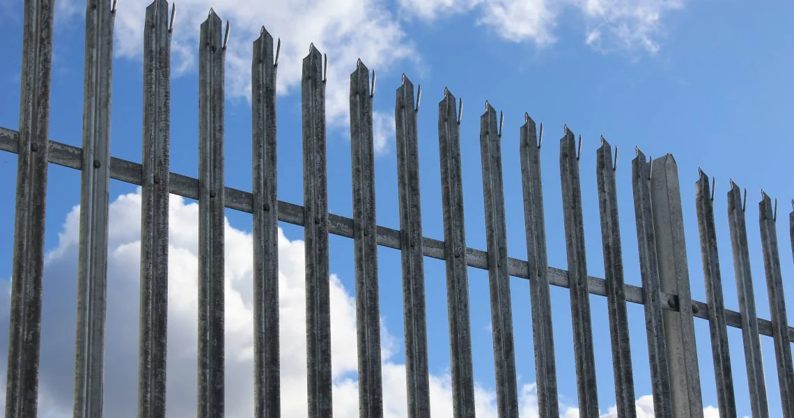 Galvanised steel palisade fencing with pointed pale heads